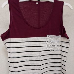 Color block tank top with lace pocket.